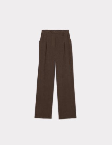 Pantalon large élastiqué - taupe - celio - Modalova