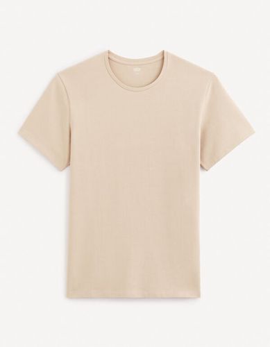 T-shirt à col rond en coton stretch - beige - celio - Modalova
