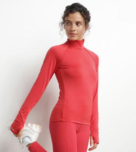 Haut de sport à col montant en microfibre Move - DIM - Modalova