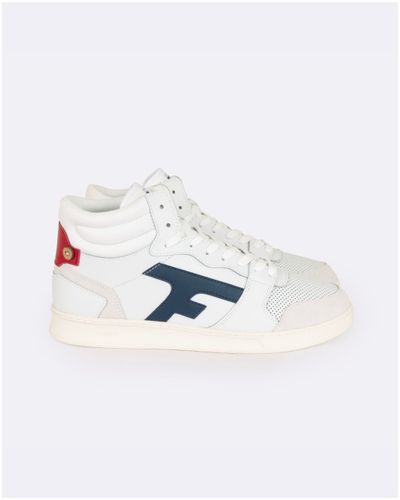 Baskets blanches & bleu marine - FAGUO - Modalova