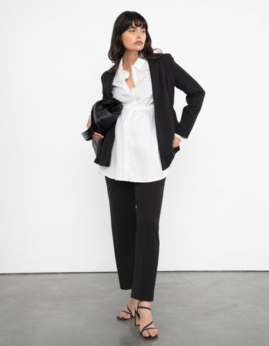 Pantalon de grossesse fuselé noir - Seraphine - Modalova