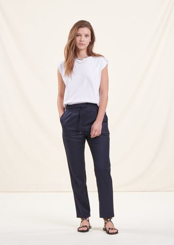 Pantalon bleu coupe carotte - La Fée Maraboutée - Modalova