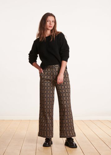 Pantalon droit 7/8ème en jacquard noir et doré - La Fée Maraboutée - Modalova