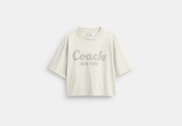 Camiseta corta de firma en cursiva - COACH® - Modalova