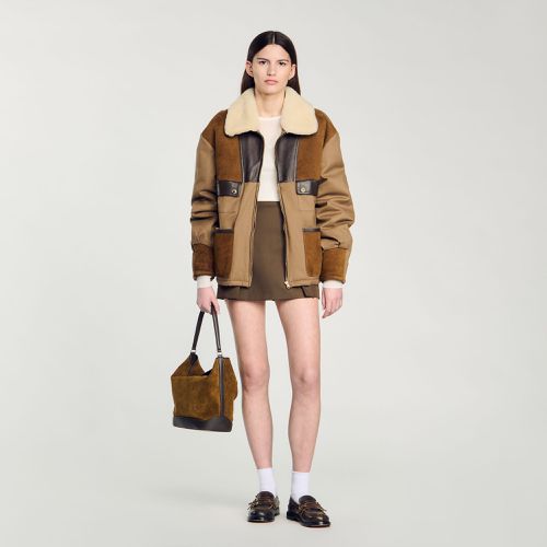 Blouson à col mouton et patchwork cuir - Sandro Paris - Modalova