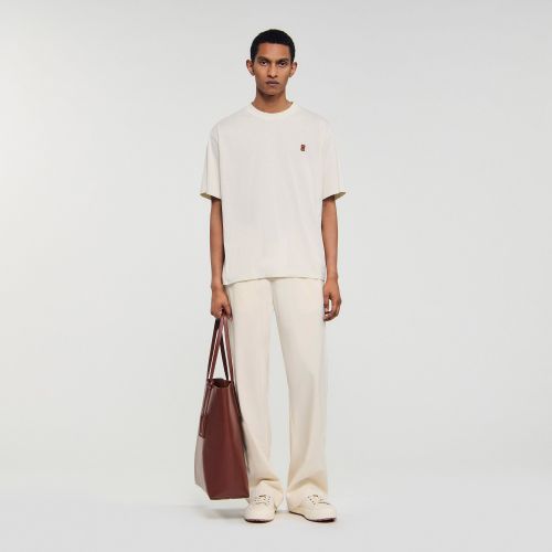 T-shirt à logo en cuir - Sandro Paris - Modalova