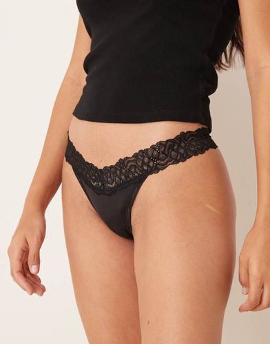 Attraction - String avec détails en dentelle - Calvin Klein - Modalova