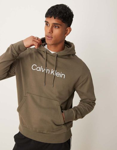 Hero - Sweat à capuche confort à logo - olive - Calvin Klein - Modalova