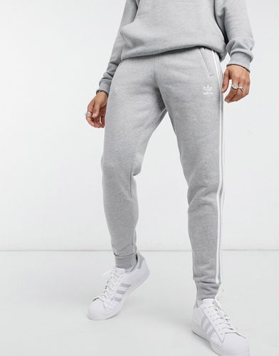 Adicolor - Jogger coupe skinny à trois bandes - chiné - Adidas Originals - Modalova