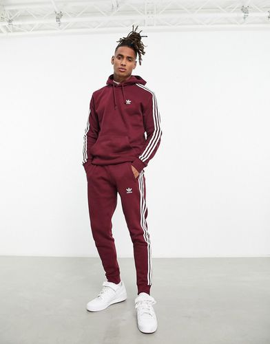 Adicolor - Jogger à 3 bandes - Bordeaux - Adidas Originals - Modalova