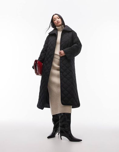 Manteau matelassé oversize longueur mollet avec col montant et fentes latérales - Arket - Modalova