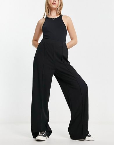 ASOS DESIGN - Pantalon ample et fluide en jersey - Asos Design - Modalova