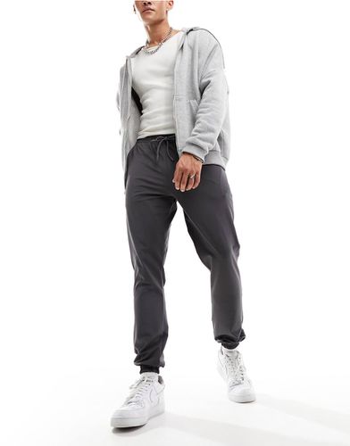 Icon - Pantalon de jogging de sport coupe slim à séchage rapide - anthracite - Asos 4505 - Modalova