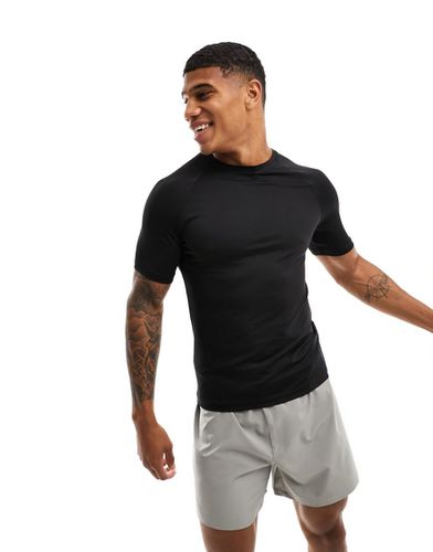 Icon - T-shirt de sport moulant en tissu à séchage rapide - Asos 4505 - Modalova