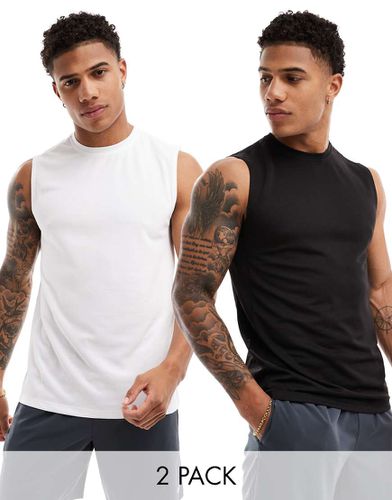 Lot de 2 t-shirts de sport sans manches emblématiques en tissu à séchage rapide - Noir et blanc - Asos 4505 - Modalova