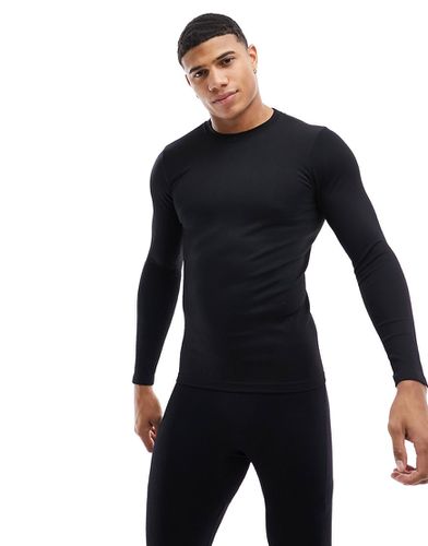 T-shirt de sous-vêtement de ski côtelé à manches longues sans coutures - Asos 4505 - Modalova