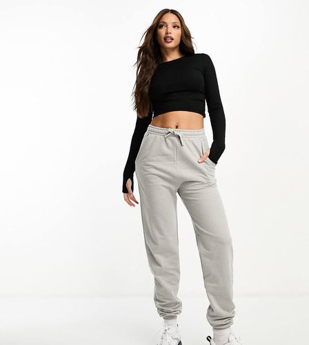 Tall - Top de sport côtelé d'ensemble à manches longues et détail froncé - Asos 4505 - Modalova