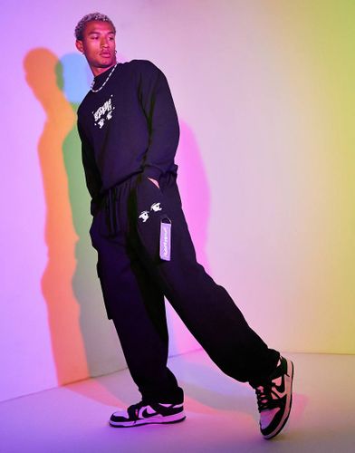 ASOS - Unrvlld Spply - Jogger oversize avec poche et brides - Asos Design - Modalova