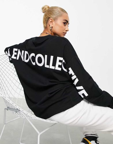 ASOS - Weekend Collective - T-shirt oversize à manches longues avec logo dans le dos - Noir - Asos Weekend Collective - Modalova