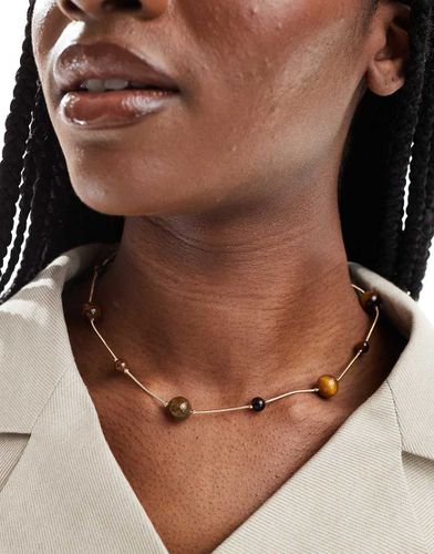 Collier court avec pierres ail de tigre semi-précieuses de tailles variées - Doré - Asos Design - Modalova