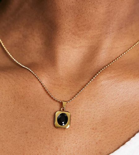 Collier réglable plaqué or 14 carats avec pendentif pierre noire - Asos Design - Modalova