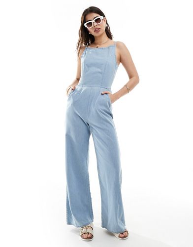 Combinaison minimaliste à bretelles en jean - Bleu moyen - Asos Design - Modalova