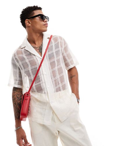 Chemise coupe décontractée transparente à carreaux avec manches courtes et col à revers - Asos Design - Modalova