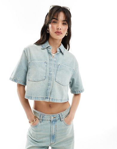 Chemise courte d'ensemble en jean délavé - Asos Design - Modalova