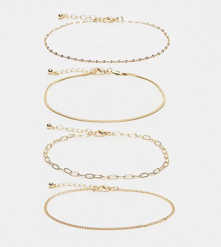 ASOS DESIGN Curve - Lot de 4 bracelets de cheville avec chaînes - Asos Curve - Modalova