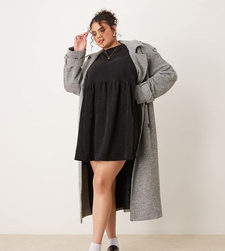 ASOS DESIGN Curve - Robe t-shirt babydoll courte en velours côtelé avec couture à la taille - Asos Curve - Modalova