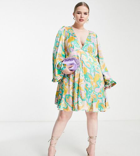 ASOS DESIGN Curve - Robe babydoll courte à imprimé fleurs abstraites de couleurs vives avec godets et manches évasées - Asos Curve - Modalova