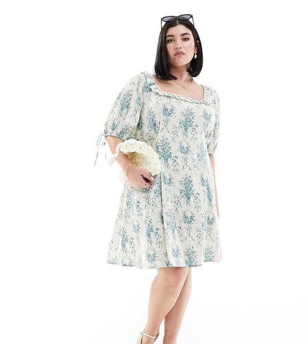 ASOS DESIGN Curve - Robe courte à fleurs avec col à volants et manches bouffantes - Bleu - Asos Curve - Modalova