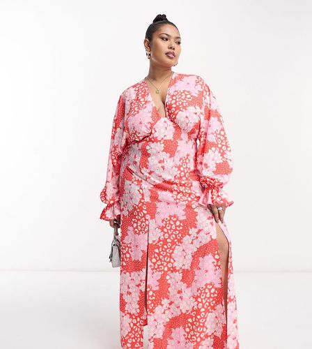 ASOS DESIGN Curve - Robe longue à imprimé effet raccordé avec décolleté plongeant et manches chauve-souris - Rose - Asos Curve - Modalova