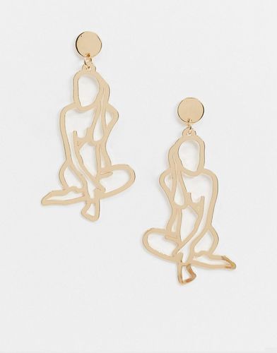 Boucles d'oreilles avec silhouette de corps féminin - Asos Design - Modalova