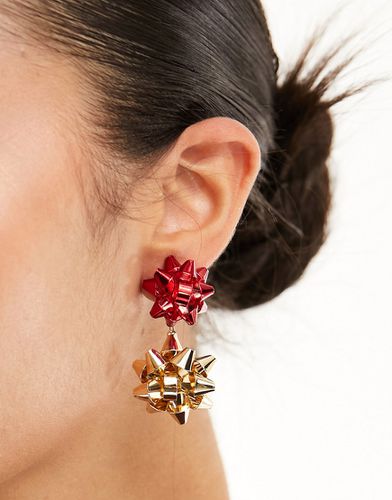 Boucles d'oreilles de Noël avec pendant style naud - Asos Design - Modalova