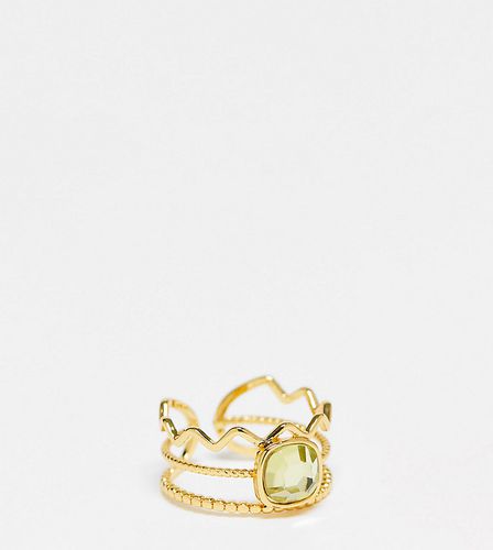 Bague en plaqué or 14 carats avec plusieurs bandes incrustées de cristaux verts - Asos Design - Modalova