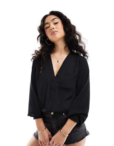 Blouse manches longues avec poche - Asos Design - Modalova