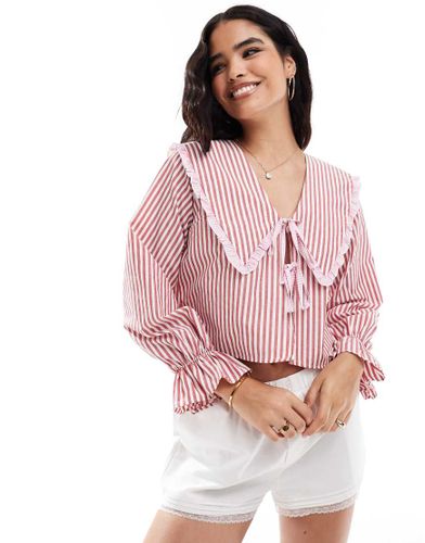 Blouse à grand col nouée sur le devant à rayures - Asos Design - Modalova