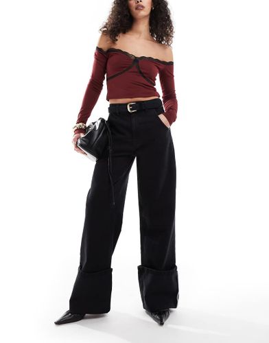 Jean ample avec large revers - Noir dlav - Asos Design - Modalova
