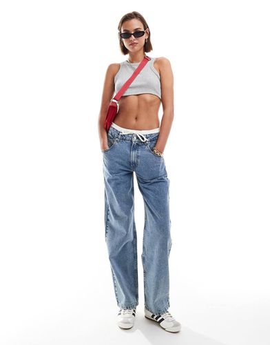 Jean baggy avec taille style caleçon - clair délavé - Asos Design - Modalova