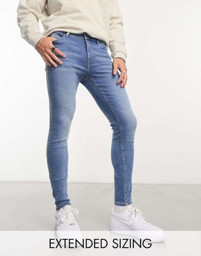 Jean en denim stretch résistant - Délavage clair - Asos Design - Modalova