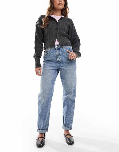 Jean mom décontracté à taille haute - moyen - Asos Design - Modalova