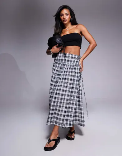 Jupe  carreaux avec taille mi-haute et tombante - Asos Design - Modalova