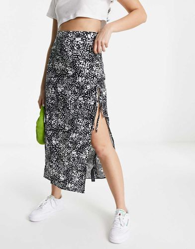 Jupe fendue mi-longue à détail noué et imprimé tacheté - Noir et blanc - Asos Design - Modalova