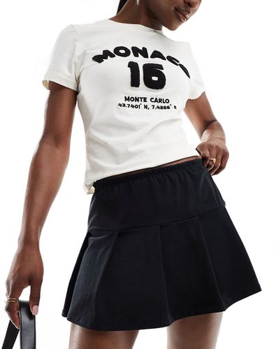 Jupe-shirt de tennis plissée - Asos Design - Modalova