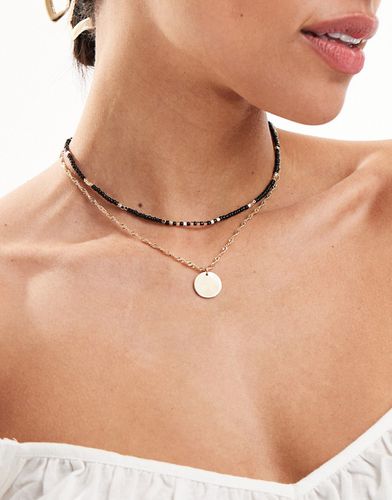 Lot de 2 colliers avec perles et pendentif rond - Asos Design - Modalova