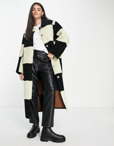 Manteau long réversible en imitation peau de mouton contrecollée - Noir et blanc - Asos Design - Modalova