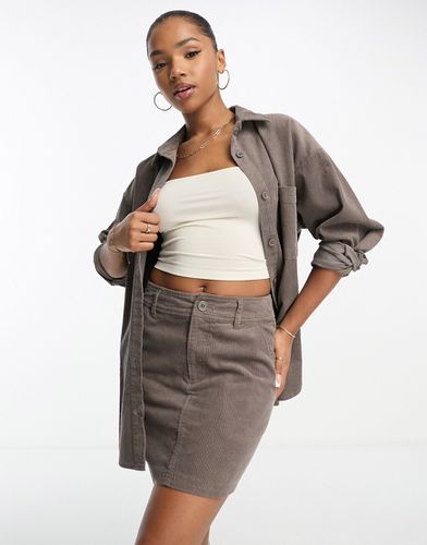 Mini-jupe trapèze en velours côtelé avec poches - Taupe - Asos Design - Modalova