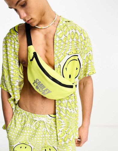 Sac banane à logo Love métallisé en collaboration avec Smiley - Asos Design - Modalova