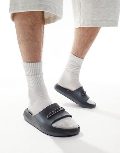 Sandales imprimées façon peinture pulvérisée vieillie à écusson logo - Asos Design - Modalova